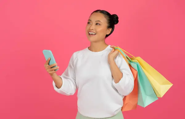 Internet Purchases Happy Asian Woman Holding Shopping Bags Smartphone Smiling — Foto Stock