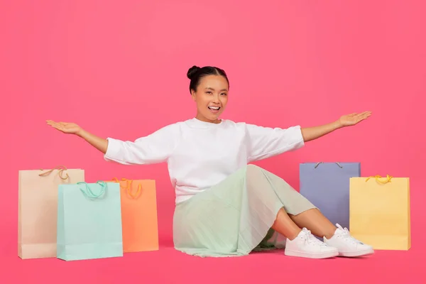 Cheerful Asian Female Sitting Floor Bright Shopping Bags Happy Korean — Fotografia de Stock
