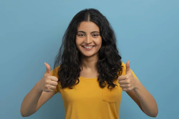Cute Pretty Young Indian Woman Wearing Yellow Shirt Showing Thumb — Stok fotoğraf