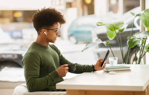 Side View Cool Millennial Black Man Wearing Eyeglasses Sitting Table — Stock Photo, Image