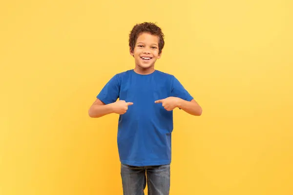 Smiling Young Boy Curly Hair Confidently Pointing Himself Both Thumbs — Stock Photo, Image