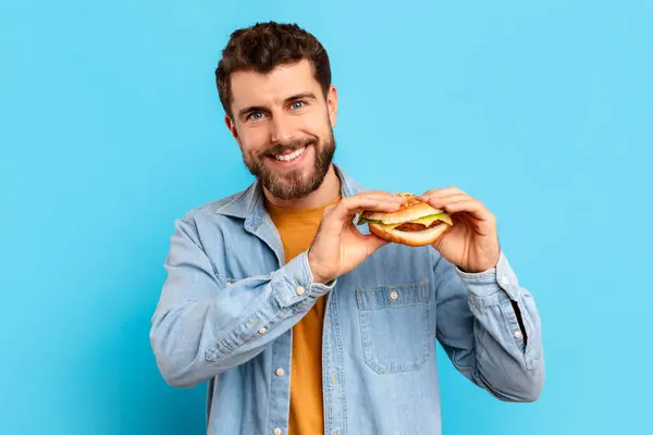 Binge Eating Habit Happy Guy Casual Holding Big Burger Eating — Stock Photo, Image