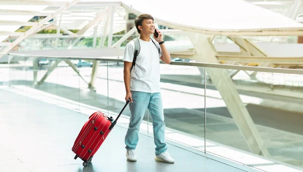 Cheerful Young Asian Guy Wearing Comfy Casual Outfit Walking Airport — Stock Photo, Image
