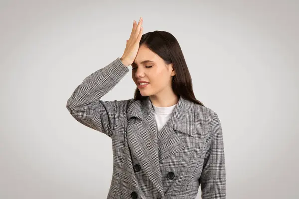 Young Professional Woman Houndstooth Coat Look Regret Hand Forehead Eyes — Stock Photo, Image