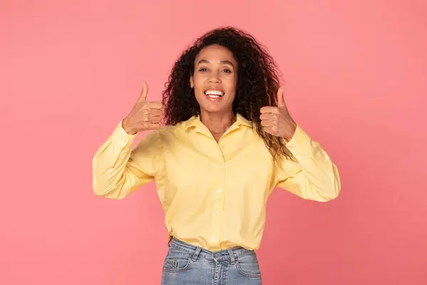 Enthusiastic Black Woman Curly Hair Giving Two Thumbs Wearing Yellow — Stock Photo, Image