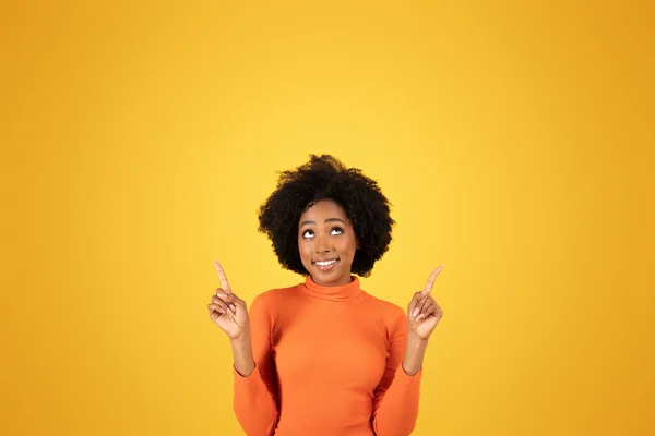 Optimistic African American Woman Looking Pointing Upwards Expressing Positivity Wearing — Stock Photo, Image
