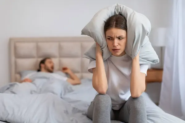 Disturbed Young Woman Covers Her Ears Pillow Block Out Loud — Stock Photo, Image