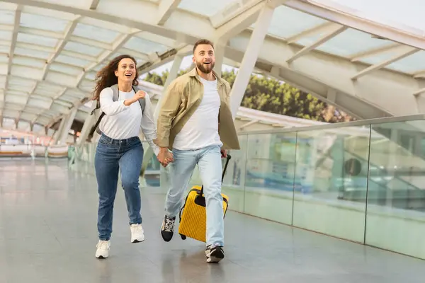 Young Couple Rush Running Yellow Suitcase Airport Happy Millennial Man — Stock Photo, Image