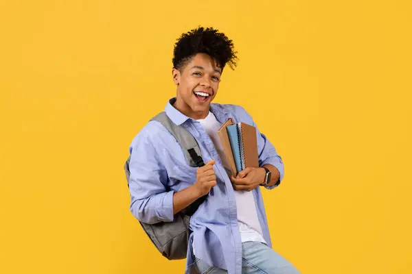 Lively Black Student Guy Charming Smile Carrying Backpack Clutching Notebooks — Stock Photo, Image