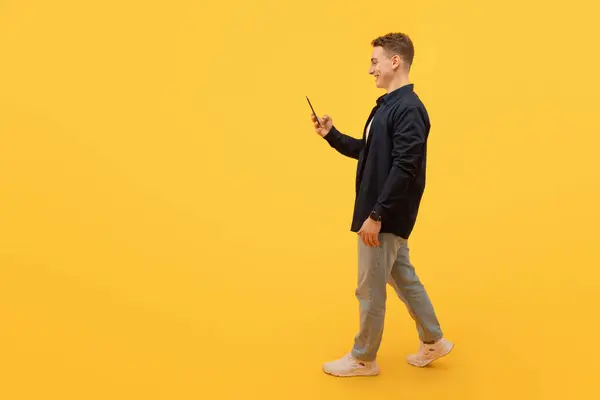 Side View Blonde Guy Casual Smartphone His Hand Walking Copy — Stock Photo, Image