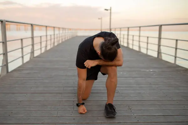 Runner Guy Takes Rest Bent Exhaustion Morning Jog Boardwalk Sea — Stock Photo, Image