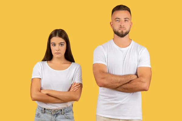 Stern Faced Young European Couple Arms Crossed White Shirts Exuding — Stock Photo, Image