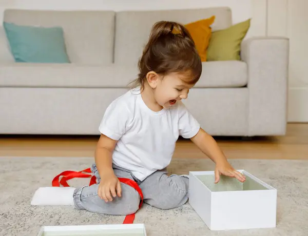 Excited Little Girl Delightful Smile Opening White Gift Box Red — Stock Photo, Image