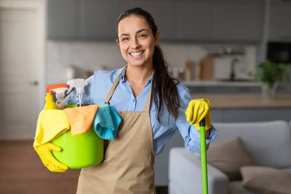 Happy Woman Equipped Mop Bucket Full Cleaning Supplies Flashes Warm — Stock Photo, Image