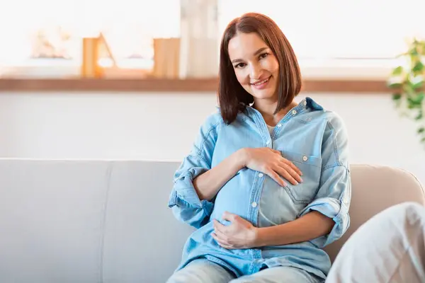 Pregnancy Concept Smiling Expectant Mother Lovingly Hugging Her Growing Belly — Stock Photo, Image