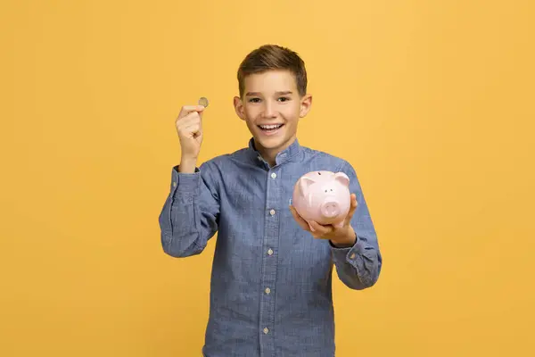 Cheerful Teen Boy Holding Coin Pink Piggy Bank Happy Male — Stock Photo, Image
