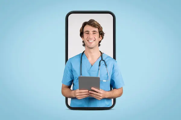 Joyful Male Nurse Blue Uniform Displayed Smartphone Interface Symbolizing Easy — Stock Photo, Image