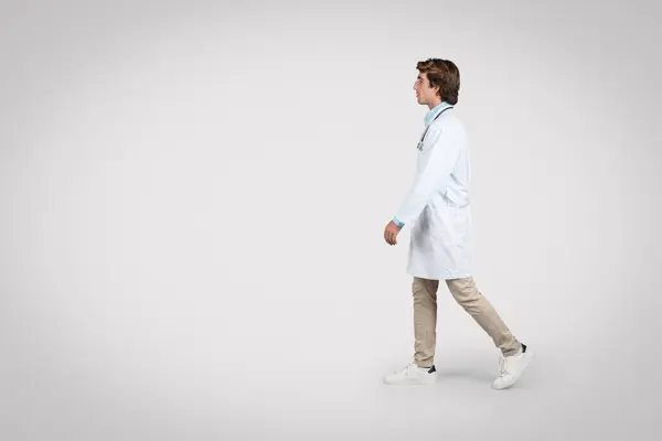 Side View Walking Male Doctor White Lab Coat Capturing Motion — Stock Photo, Image