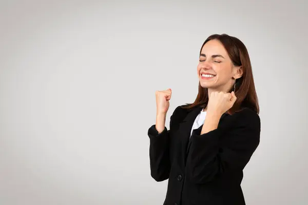 Ecstatic Young Caucasian Businesswoman Chic Black Suit Pumps Her Fists — Stock Photo, Image