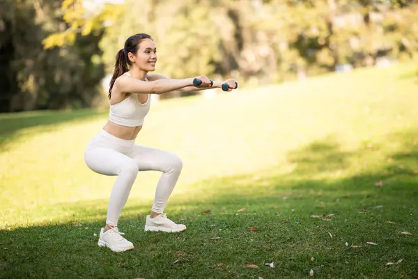 Young Athletic Millennial Caucasian Woman White Sportswear Doing Squats Dumbbells — Stock Photo, Image