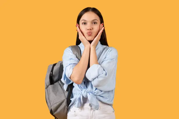 Playful Student Lady Stands Her Hands Her Face Puckered Lips — Stock Photo, Image