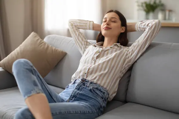 Tranquil Young Woman Enjoying Peaceful Moment Reclining Hands Head Soft — Stock Photo, Image