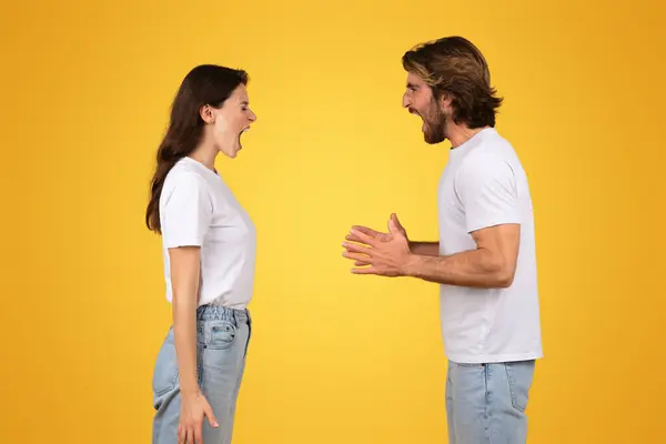 Intense European Young Couple White Shirts Engaging Verbal Disagreement Animated — Stock Photo, Image
