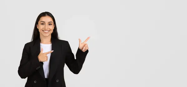 Cheerful Young Businesswoman Black Suit White Shirt Pointing Both Hands — Stock Photo, Image