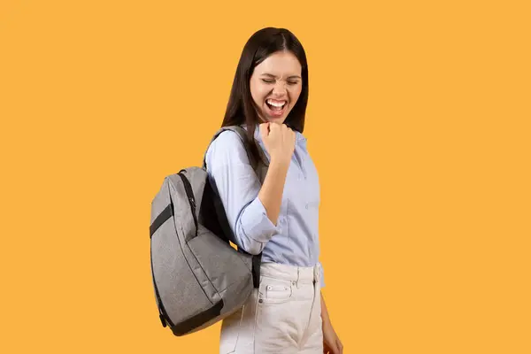 Cheerful Young Student Wit Backpack Raises Her Fist Gesture Victory — Stock Photo, Image