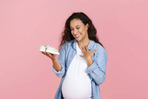 Motherhood Concept Excited Pregnant Woman Big Belly Looking Baby Shoes — Stock Photo, Image