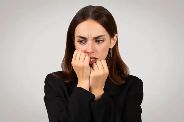 Anxious Caucasian Millennial Businesswoman Biting Her Nails Look Deep Concern — Stock Photo, Image