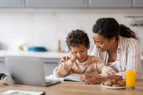 Smiling Young African American Mother Assisting Her Preteen Son His — Stock Photo, Image