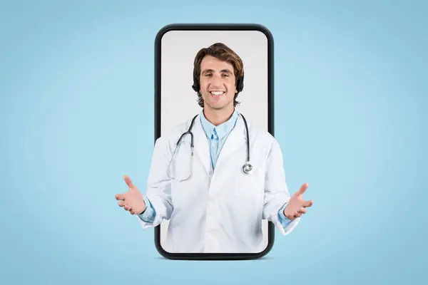 stock image Charismatic young male doctor offering virtual medical advice, framed within smartphone outline, signifying cutting-edge telemedicine consultations