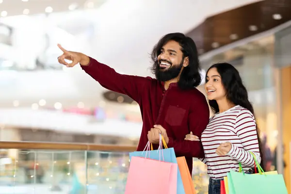 Excited Eastern Millennial Man Woman Enjoying Season Sale Shopping Mall — Stock Photo, Image