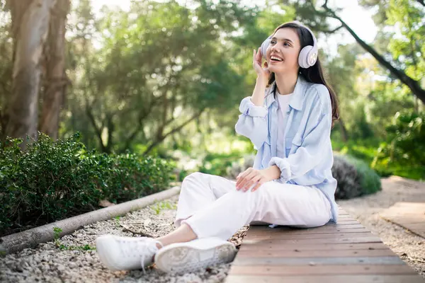 Delighted European Young Woman Student White Headphones Looking Smiling Enjoying — Stock Photo, Image