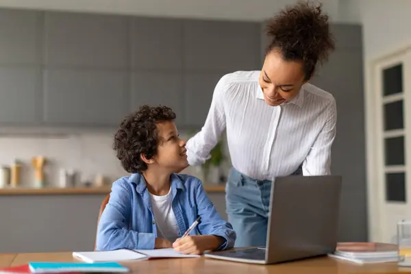 Focused Scene Mother Assisting Her Young Son His Studies Modern — Stock Photo, Image