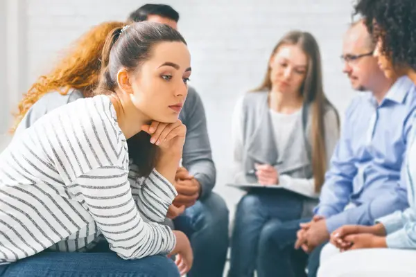 stock image Awareness of addiction. Stressed thoughtful woman during group therapy, free space