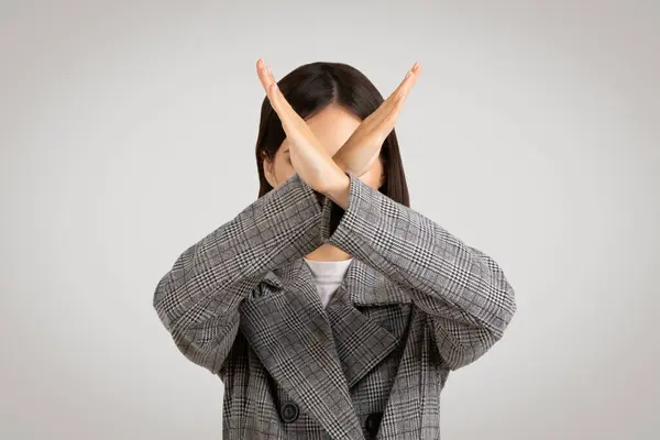 Businesswoman Houndstooth Jacket Making Clear Gesture Her Hands Crossed Signaling — Stock Photo, Image