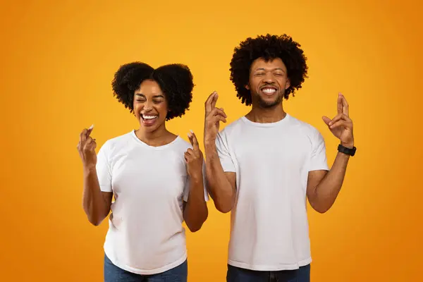 Superstitious Young African American Couple Cross Fingers Smiling Closed Eyes — Stock Photo, Image