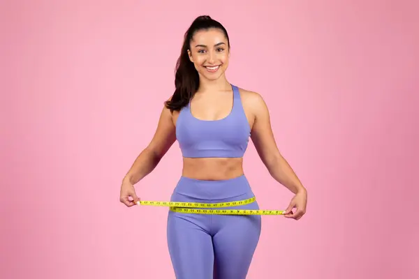 Confident Woman Illustrating How Measure Hips Tape Measure Focus Technique — Stock Photo, Image