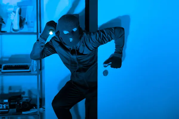 Shifty Criminal Flashlight Ski Mask Captured Motion Burglary Room Illuminated — Stock Photo, Image