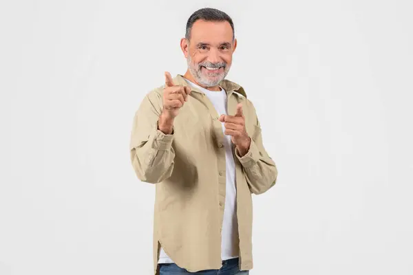 Cheerful Older Man Pointing Confidently Camera Both Hands Suggesting Choice — Stock Photo, Image