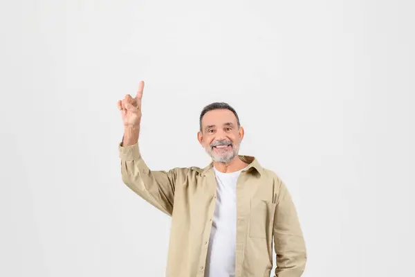Joyful Smiling Senior Man Pointing Upwards One Arm Excited Something — Stock Photo, Image