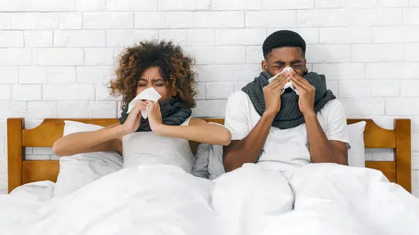 Sick African American Couple Blowing Noses Bed Having Flu Together — Stock Photo, Image