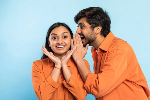 Joyous Young Indian Woman Reacting Man Whispering Her Ear Blue — Stock Photo, Image