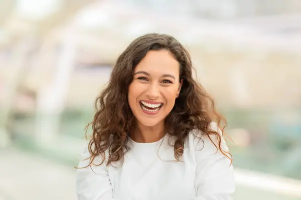 Radiant Beautiful Woman Laughing Camera While Standing Airport Terminal Portrait — Stock Photo, Image