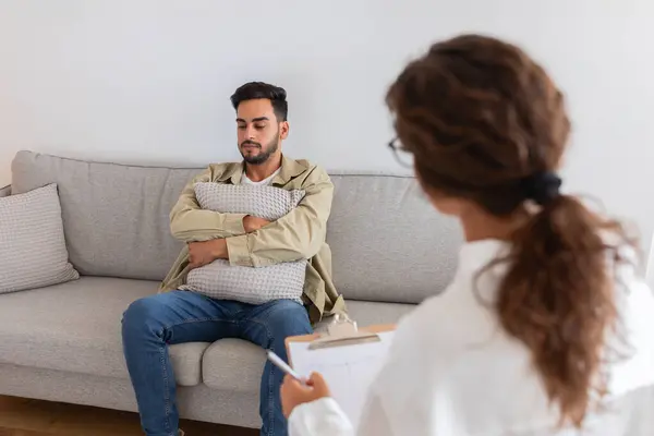 Therapy Session Middle Eastern Man Seeking Help Clutches Pillow While — Stock Photo, Image
