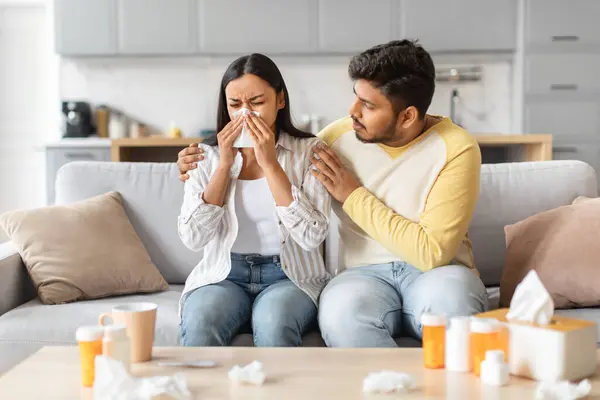 Indian Man Consoling Sick Woman Who Sneezing Tissue Surrounded Cold — Stock Photo, Image