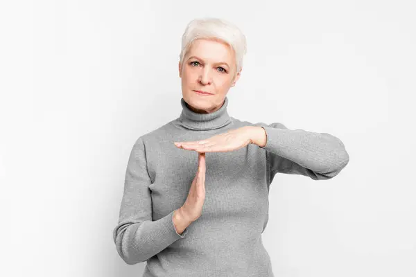 Senior Elderly European Woman Performs Timeout Gesture Illustrating Moment Pause — Stock Photo, Image