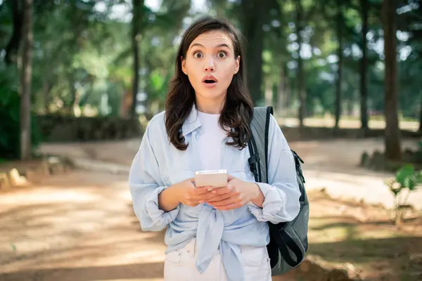 Shocked Young Woman Student Reacts Surprising Message Her Phone Outdoors — Stock Photo, Image